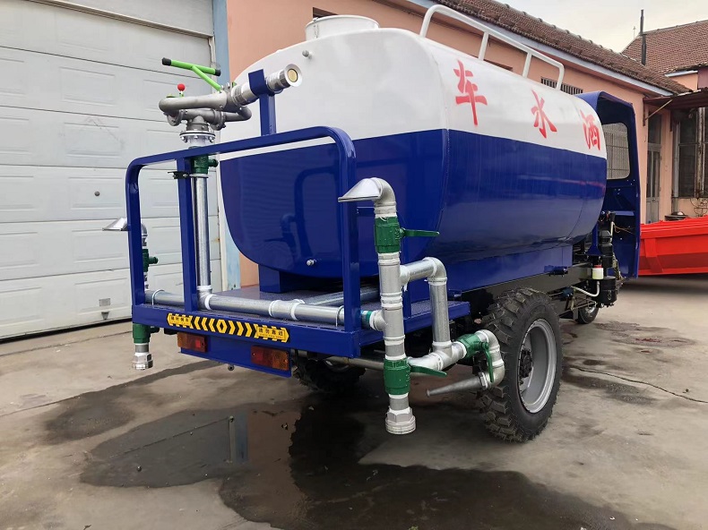 Diesel tricycle converted into sprinkler - landscaping road cleaning machinery(back)
