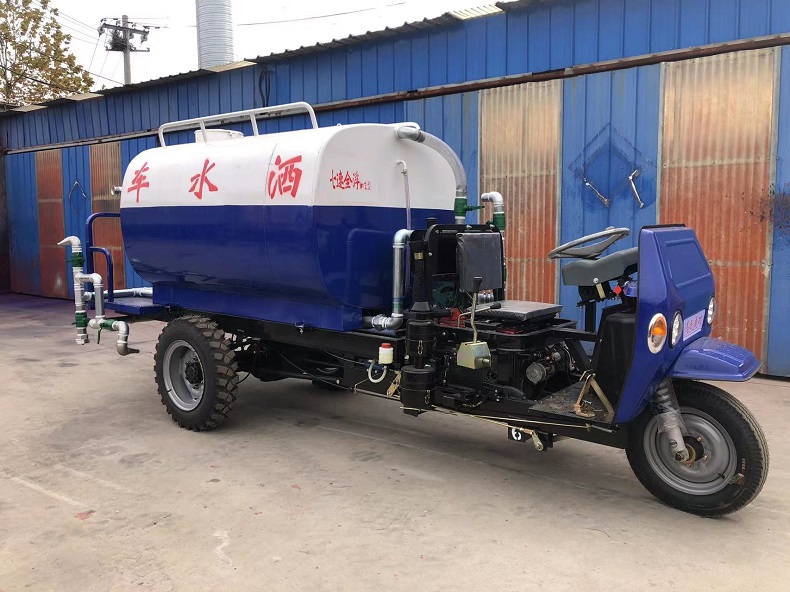 Diesel tricycle converted into sprinkler - landscaping road cleaning machinery(side)