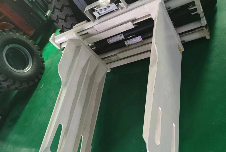 RT Forklift with Clamp attachment