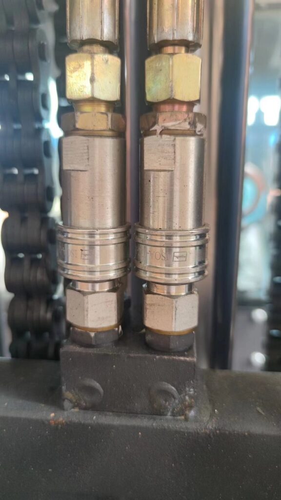 Quick couplings for forklift attachments