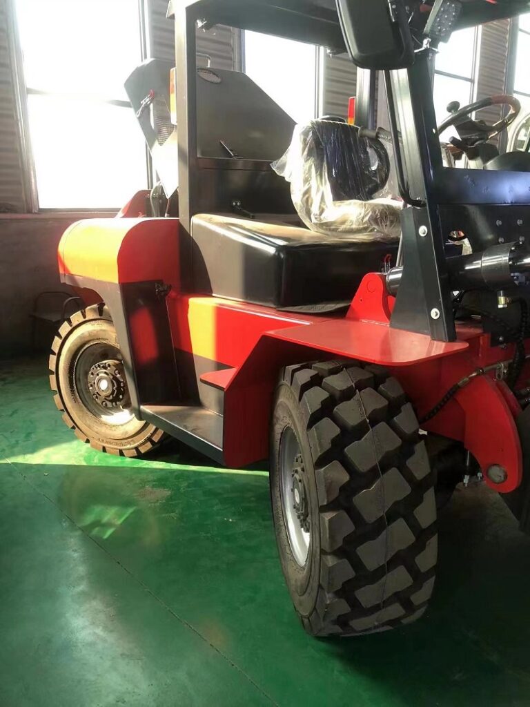 a red CPCY45(Pioneer45) 4.5t four wheel drive forklift ,show out the four wheel steering