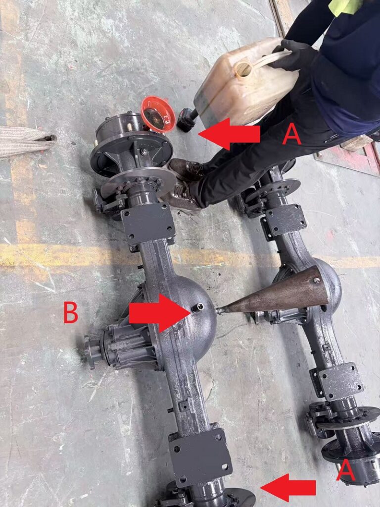 Wheel reduction drive axle gear oil filling ports inspection and maintenance for 4WD rough terrain forklift