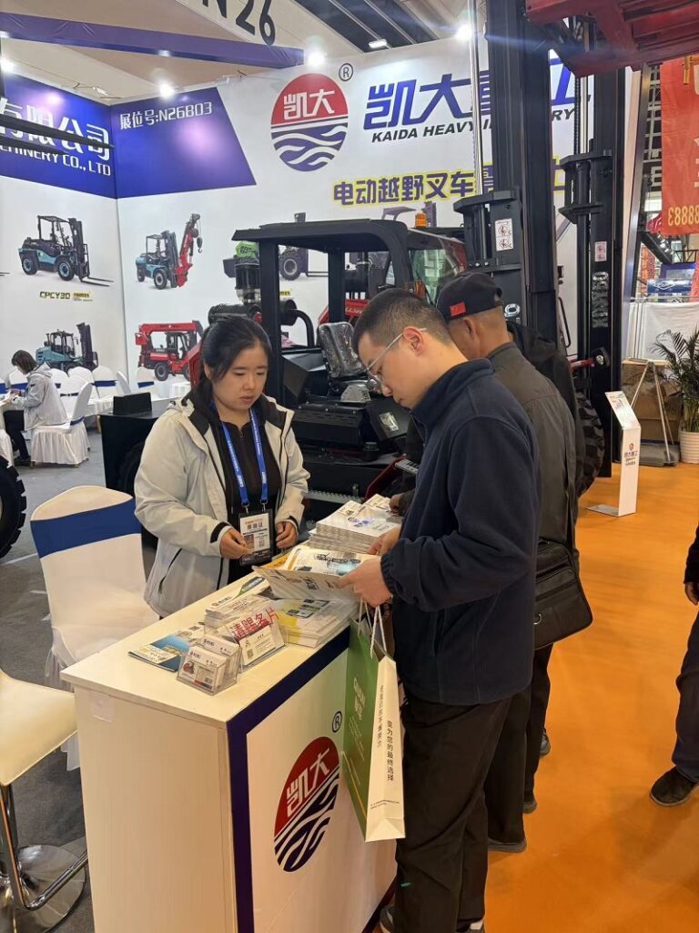 Overseas buyers checking rough terrain forklifts and corn bin attachments
