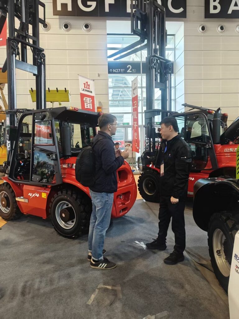 Sales director Derick communicating with international customers at CIAME exhibition